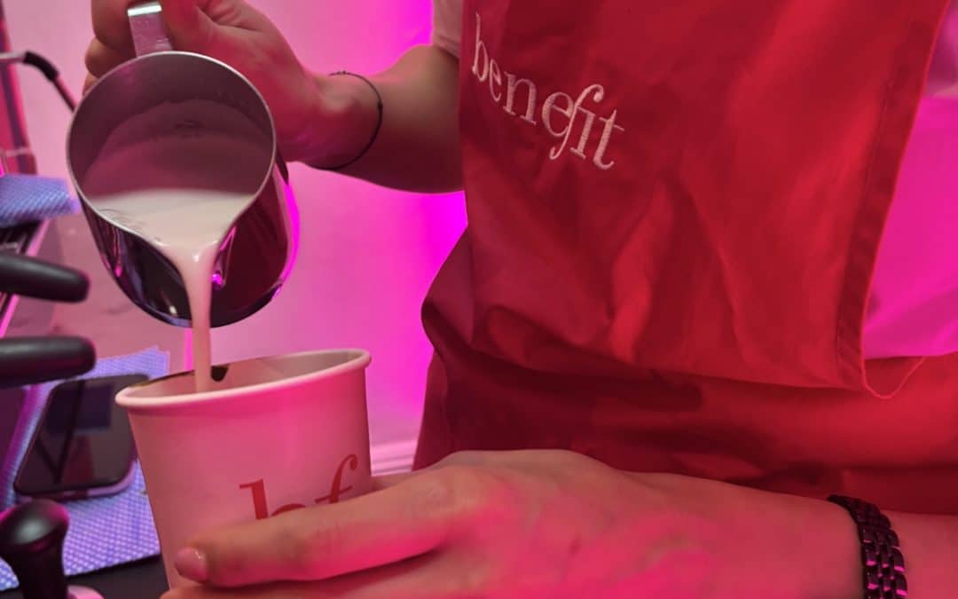 Mobile barista pouring milk at a mobile coffee bar